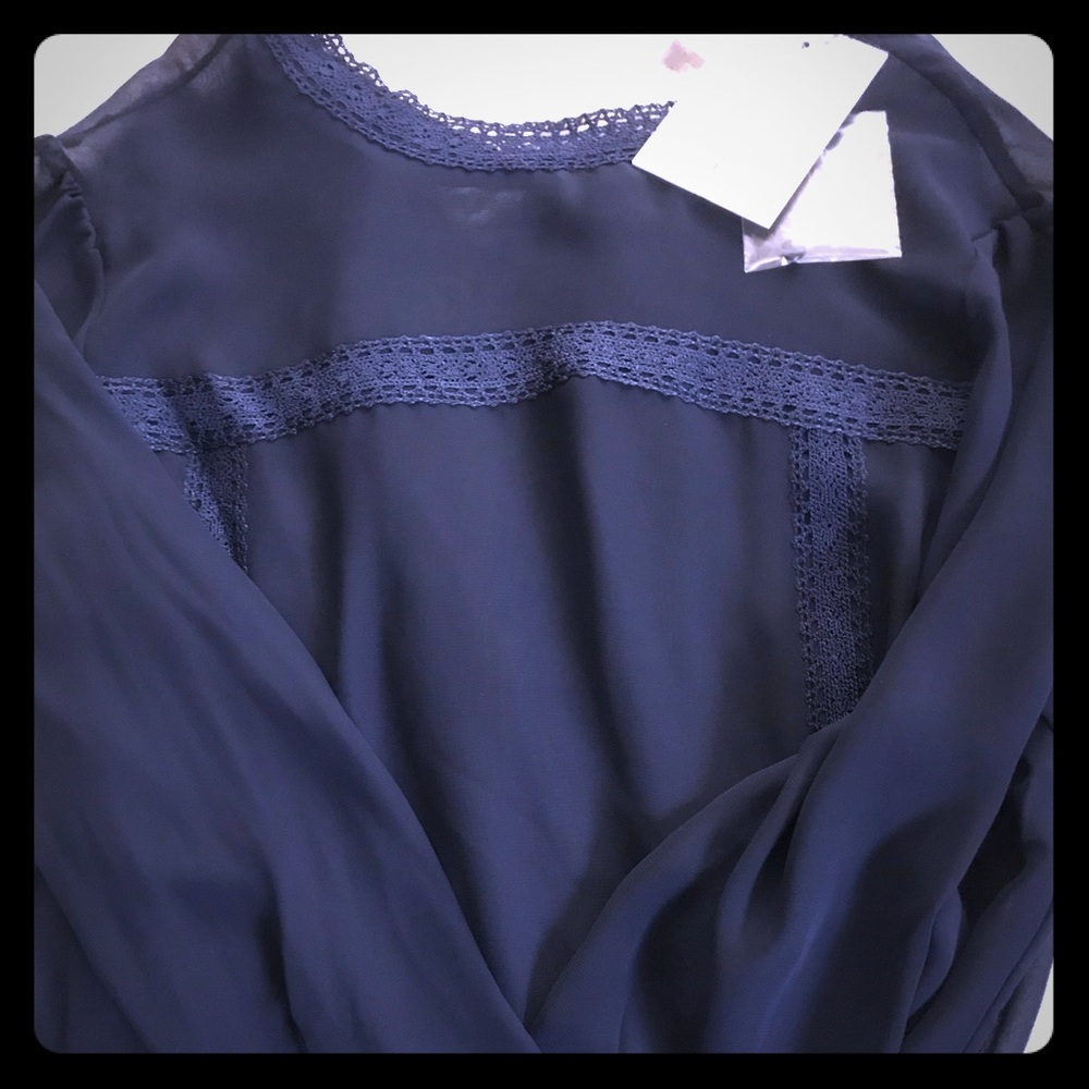 Lauren Conrad tent the runway. Sheer. Navy blue